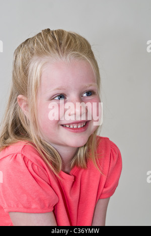 happy Thrilled  young girl smiling child anticipating surprise 5-6 year old girl. MR © Myrleen Pearson Stock Photo