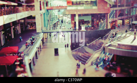 A tilt shift view of Cabot Circus shopping centre mall in Bristol, England. Shallow depth of field Stock Photo