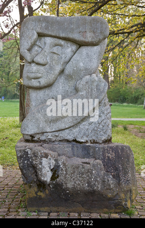 Ronald Rae's granite sculpture - the Golgotha Madonna, one of five works on this theme in the gardens of Rozelle Park in Ayr Stock Photo