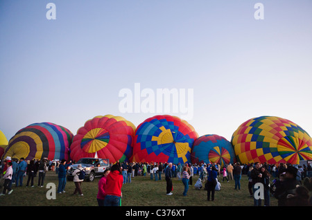 Hot air balloons being prepped to fly. Hot air Balloon Fiesta, October, 2010. Albuquerque, New Mexico, USA. Stock Photo