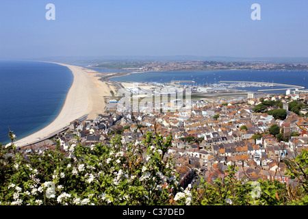 View of Chesil Beach, Fortuneswell and the harbour from the War Memorial at Portland, Weymouth, Dorset, England UK Stock Photo