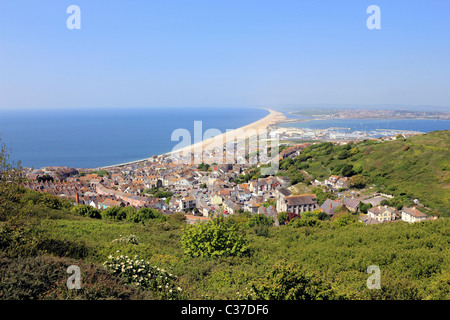 View of Chesil Beach, Fortuneswell and the harbour from the War Memorial at Portland, Weymouth, Dorset, England UK Stock Photo