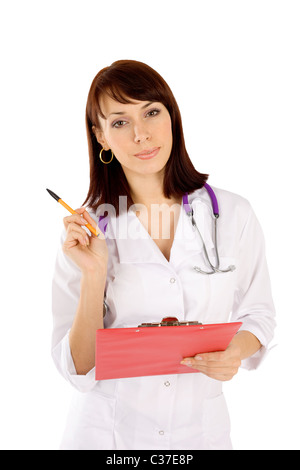 Smiling friendly female doctor holding pen and clipboard looking at camera, isolated on white background Stock Photo