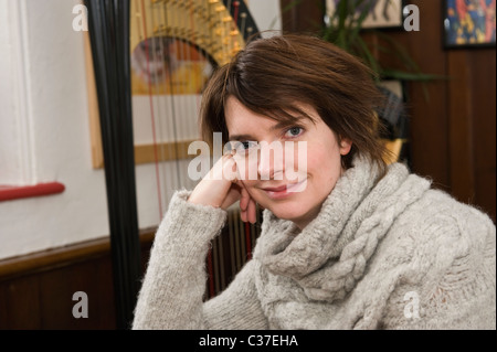 Portrait of Welsh harpist Catrin Finch at her Acapela concert hall and studio near Cardiff South Wales UK Stock Photo