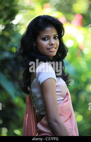 Sri Lankan lady posing in a garden Sri Lanka Asia Stock Photo