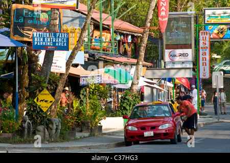 Street scene Manuel Antonio Town at the entrance of Manuel Antonio National Park Puntarenas province Costa Rica Stock Photo