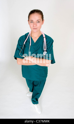 Portrait of young nurse serious with arms crossed Stock Photo