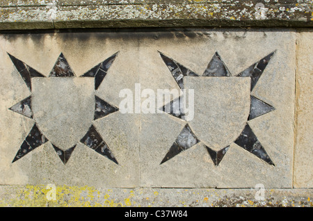 Decorative flushwork on an exterior wall of The Parish Church of St Mary the Virgin, Diss, Norfolk, England, UK Stock Photo
