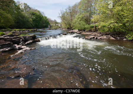 A small waterfall on the river Usk at Llangynidr bridge Stock Photo