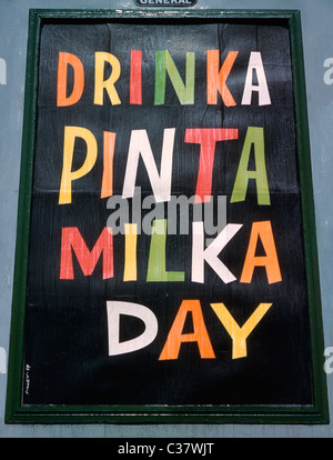 1959 poster on an advertising hoarding or billboard in north London - it has the promotional slogan 'Drinka Pinta Milka Day' Stock Photo