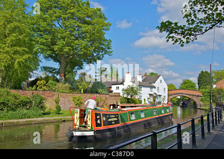 Bridgewater House on the canal at Lymm with narrowboats. Stock Photo