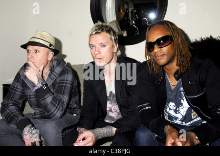 Keith Flint, Liam Howlett and Maxim Reality British electronic music group The Prodigy pose for photographers after an Stock Photo