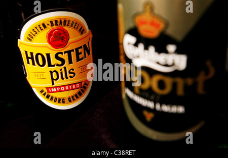 Pictured: A bottle of Holsten Pils, lager; a Carlsberg brand. Stock Photo