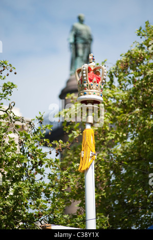 Royal crown on top of a lamp post in The Mall in central London as part of the royal wedding decorations. Stock Photo