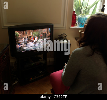 Teenager Watching the Royal Wedding on Television Stock Photo