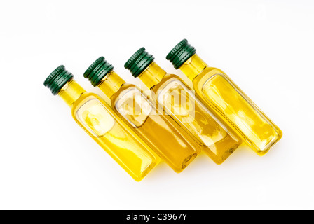 Four bottles of extra virgin olive oil Stock Photo