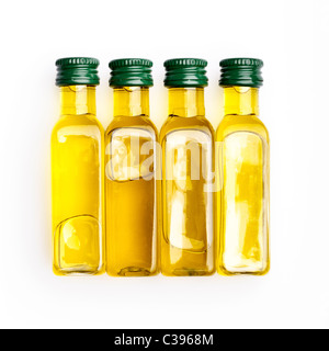 Four bottles of extra virgin olive oil Stock Photo