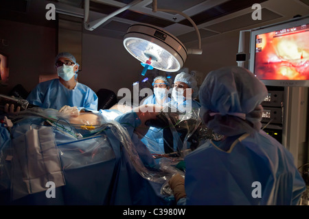 Doctor Prepares for Robotic Surgery Stock Photo