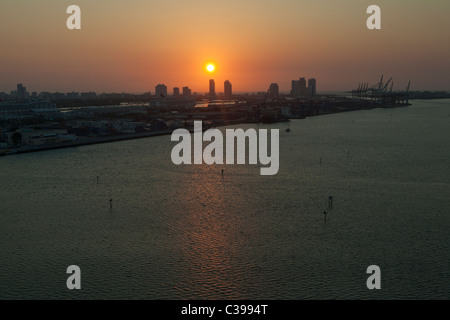 Sunrise in Miami Beach, seen from Downtown Miami. Stock Photo