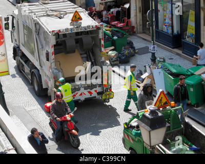 Paris, France, Sanitation Workers Loading Garbage wheely bin at Back of French Dump Trash Truck, on street, waste containers Stock Photo