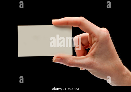 hand and fingers holding blank business card Stock Photo