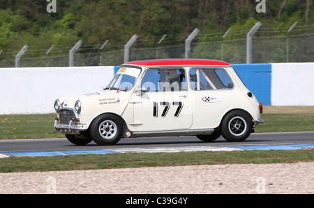 white racing mini with red roof Stock Photo