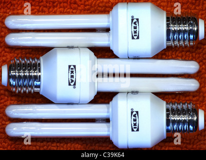 Three Ikea energy saver lightbulbs Stock Photo