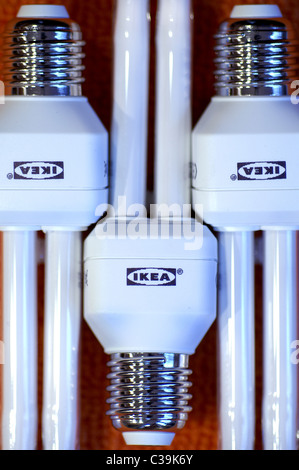 Three Ikea energy saver lightbulbs Stock Photo