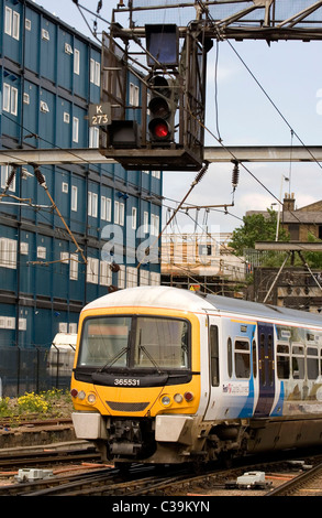 A train passes a signal box at King's Cross Station, London. 12/05/09 Stock Photo