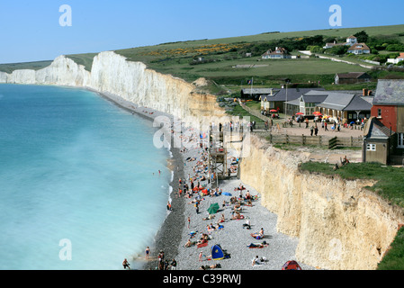 Birling Gap, between the Seven Sisters cliffs (background) and Beachy Head, East Sussex. Part of the South Downs National Park. Stock Photo