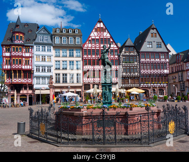 Romer Square with historic timbered houses and Justitia fountain at Frankfurt am Main in old town Germany Stock Photo