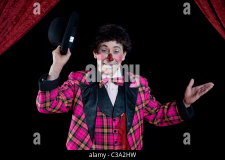 Circus Clown Waving Arms Stock Photo - Alamy