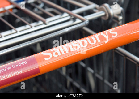 Sainsbury's supermarket trolleys outside a store in North London. Stock Photo