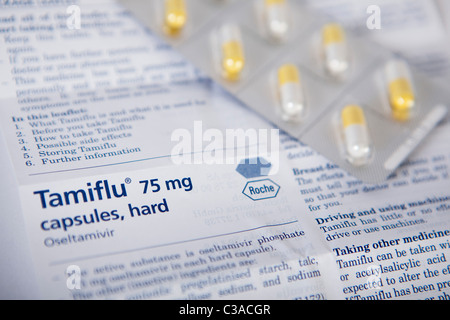 Illustrative image of a Tamiflu information leaflet and tablet pack. Stock Photo