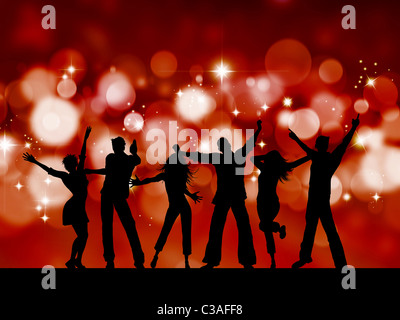 Silhouettes of people dancing on blurred lights background Stock Photo