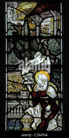 A Stained glass window by the Kempe Studios, St Mary's Church, Mucklestone, Staffordshire; Apperance to Mary Magdalene Stock Photo
