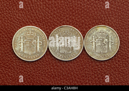 five pesetas spain old coins Alfonso XII Carlos III Ioseph Napoleon Stock Photo