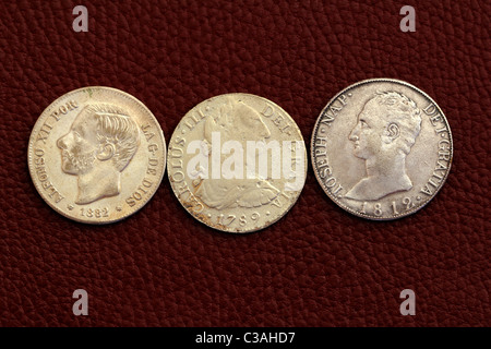 five pesetas spain old coins Alfonso XII Carlos III Ioseph Napoleon Stock Photo