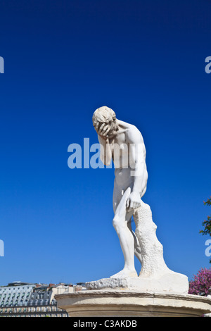 A statue of Cain after killing his brother Abel by Henri Vidal in the Tuileries Garden, Paris Stock Photo