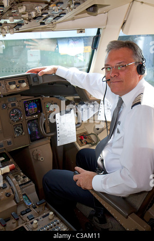 Copilot in the cockpit of a Boeing 767 aircraft. Stock Photo