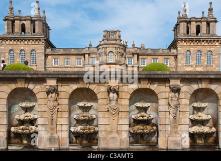 Fountains at the formal gardens of Blenheim palace with the palace in the background. England. Stock Photo