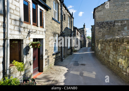 Traditional stone houses along the main street in Heptonstall, near Hebden Bridge, West Yorkshire, UK Stock Photo