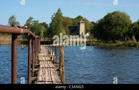 View of Great Livermere Church (St Peter's) from a pier on Ampton water, Suffolk Stock Photo