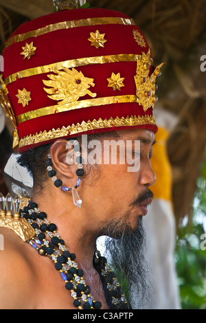 A HINDU PRIEST says prayers at the anniversary ceremony of PURA PRAJAPATI near UBUD - BALI Stock Photo