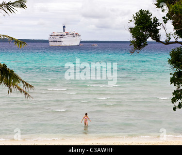 Lifou Island New Caledonia – tourists from cruise ship enjoying the beach Stock Photo