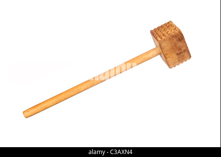 An old wooden meat tenderizing hammer isolated on white Stock Photo