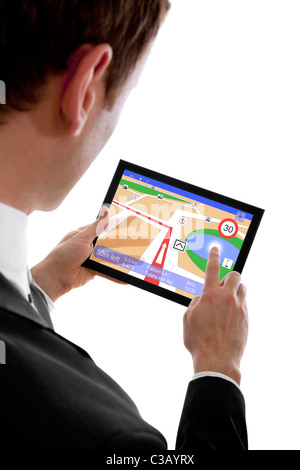 businessman holding a touchpad pc, using the navigation programme, isolated on white Stock Photo