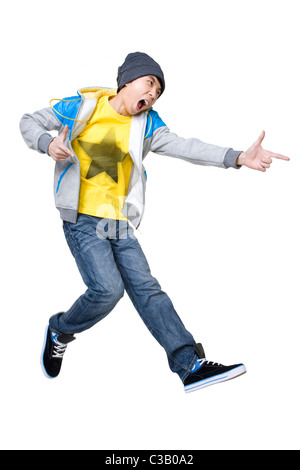 Man jumping in the air with hand gestures Stock Photo