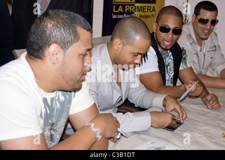 Lenny Santos, Anthony Romeo Santos, Henry Santos Jeter and Max Santos Aventura sign copies of their new CD 'The Last' at Wal Stock Photo