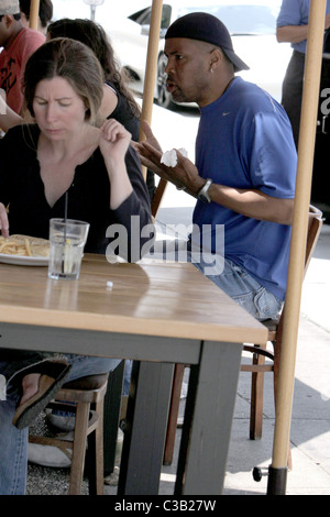 Eriq La Salle eating at Toast Bakery Cafe while wearing a backwards ...